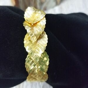 Gold leaves clamper style bracelet